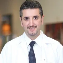 Uzm. Dr. İrfan Öğretmen — Antalya. Portre fotoğrafı.