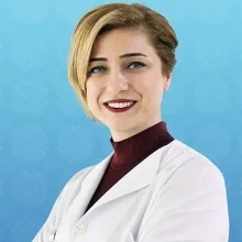 Dr. Öğr. Üyesi Tuba Develi — İstanbul. Portre fotoğrafı.
