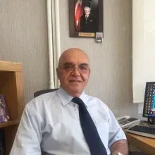 Prof. Dr. Hüsnü Çağlar — Kadın Hastalıkları Ve Doğum, Konak, İzmir. Portre fotoğrafı.