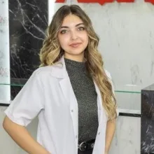 Psk. Alara Cömert Göçmen — Psikoloji. Portre fotoğrafı.