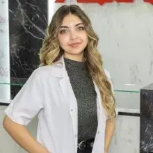 Psk. Alara Cömert Göçmen — Psikoloji. Portre fotoğrafı.