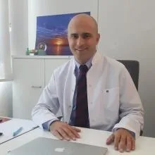 Doç. Dr. Can Tekin İskender — Ankara. Portre fotoğrafı.