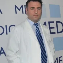 Dt. Zafer Gölcü — Diş Hekimi, Konya. Portre fotoğrafı.