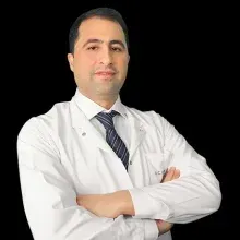 Uzm. Dr. Ercan Bıçakcı — Gastroenteroloji, Nilüfer, Bursa. Portre fotoğrafı.