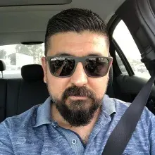 Dt. Hasan Telli — Diş Hekimi, Adana. Portre fotoğrafı.