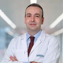 Doç. Dr. Kuntay Kaplan — Seyhan, Adana. Portre fotoğrafı.