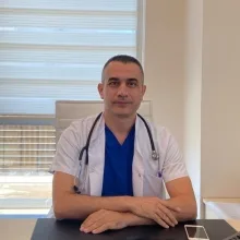 Uzm. Dr. Sancar Eminoğlu — Ankara. Portre fotoğrafı.