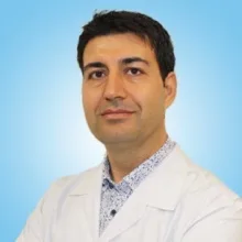 Doç. Dr. Mahmut Kaya — Göz Hastalıkları, İzmir. Portre fotoğrafı.