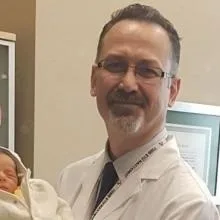 Doç. Dr. M. Metin Altay — Kadın Hastalıkları Ve Doğum, Ankara. Portre fotoğrafı.