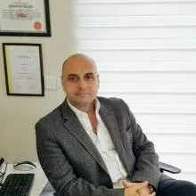 Op. Dr. Rami Asker — Kadın Hastalıkları Ve Doğum, İstanbul. Portre fotoğrafı.