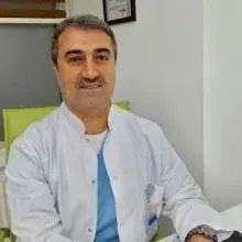 Dt. Nizamettin Arık — Diş Hekimi, İstanbul. Portre fotoğrafı.