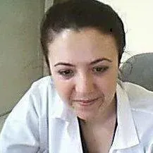 Dt. Özgür Akbaş — Diş Hekimi, Manisa. Portre fotoğrafı.