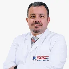 Op. Dr. Bahaddin Karadam — Ortopedi Ve Travmatoloji, İzmir. Portre fotoğrafı.