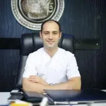 Dt. Behçet Soylu — Diş Hekimi, Afyonkarahisar. Portre fotoğrafı.