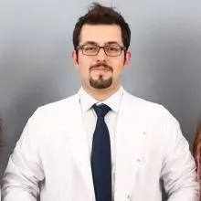 Dt. Burak Şanlı — Diş Hekimi, Gaziantep. Portre fotoğrafı.