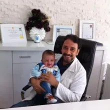 Op. Dr. Hüseyin Ziyaettin — Kadın Hastalıkları Ve Doğum, Antalya. Portre fotoğrafı.