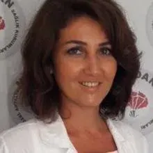 Uzm. Dr. Ayşin Mutlu Tomaç — Psikiyatri, Kepez, Antalya. Portre fotoğrafı.
