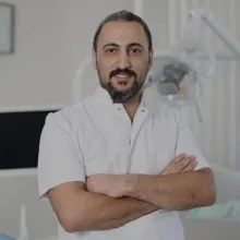 Dt. Tolga Erkol — Diş Hekimi, Mersin. Portre fotoğrafı.