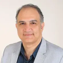 Prof. Dr. Özgür Fırat — Genel Cerrahi, İzmir. Portre fotoğrafı.