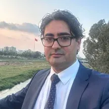 Doç. Dr. Uğur Topal — Çukurova, Adana. Portre fotoğrafı.