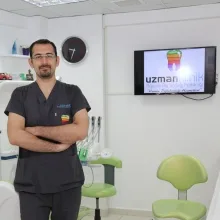 Dr. Öğr. Üyesi H. Berkay Belgin — Antalya. Portre fotoğrafı.