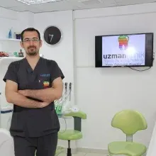 Dr. Öğr. Üyesi H. Berkay Belgin — Antalya. Portre fotoğrafı.