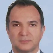 Uzm. Dr. Bülent Turgut Ay — Konak, İzmir. Portre fotoğrafı.