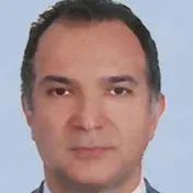 Uzm. Dr. Bülent Turgut Ay — Konak, İzmir. Portre fotoğrafı.