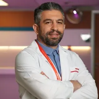 Doç. Dr. Vahit Mutlu — Genel Cerrahi, İstanbul. Portre fotoğrafı.