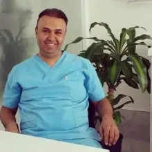 Dt. Atilla Başar — Diş Hekimi, Şehitkamil, Gaziantep. Portre fotoğrafı.