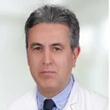 Prof. Dr. Hamdi Er — Göz Hastalıkları. Portre fotoğrafı.