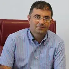 Prof. Dr. Uğur Coşkun — Ankara. Portre fotoğrafı.