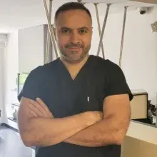 Dt. Tahsin Tolga Ertufan — Diş Hekimi, Adana. Portre fotoğrafı.