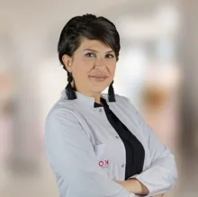Op. Dr. Meliz Onbaşıoğlu — Kadın Hastalıkları Ve Doğum. Portre fotoğrafı.