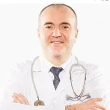 Op. Dr. M.Cumhur Tenekeci — Kalp Ve Damar Cerrahisi, Denizli. Portre fotoğrafı.
