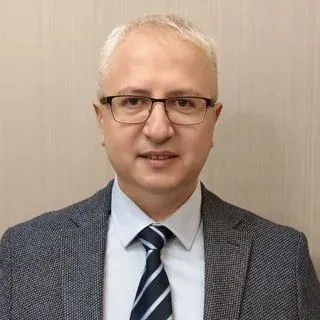 Doç. Dr. Mehmet Çınar — Kadın Hastalıkları Ve Doğum, Ankara. Portre fotoğrafı.