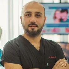 Dt. Hüseyin Emre Üçüncü — Diş Hekimi, Trabzon. Portre fotoğrafı.