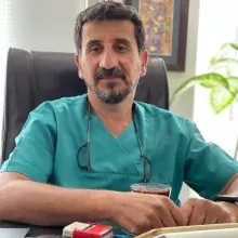 Dt. Cem Şükrü Demet — Diş Hekimi, Trabzon. Portre fotoğrafı.