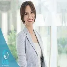 Uzm. Dr. Elif Mutlu — Psikiyatri, İstanbul. Portre fotoğrafı.