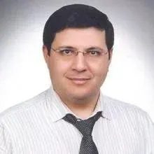 Doç. Dr. Metin Işık — Çankaya, Ankara. Portre fotoğrafı.
