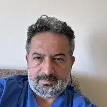Op. Dr. Muzaffer Arı — Kulak Burun Boğaz, Muratpaşa, Antalya. Portre fotoğrafı.