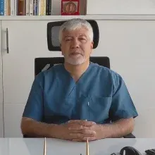 Op. Dr. Mehmet Ş. Gürsan — Genel Cerrahi, İstanbul. Portre fotoğrafı.