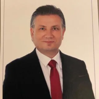 Op. Dr. M. Korhan Asal — Kulak Burun Boğaz, İzmir. Portre fotoğrafı.