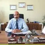 Uzm. Dr. Turan Odabaşı — Aile Hekimliği, Diyarbakır. Portre fotoğrafı.
