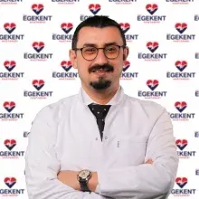 Op. Dr. Mustafa Tekin — Genel Cerrahi, Denizli. Portre fotoğrafı.