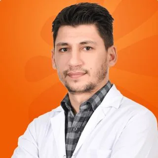 Op. Dr. Aziz Dinek — Kulak Burun Boğaz, Balıkesir. Portre fotoğrafı.