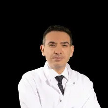 Doç. Dr. Hulusi Göktuğ Gürer — Kadın Hastalıkları Ve Doğum, Eskişehir. Portre fotoğrafı.