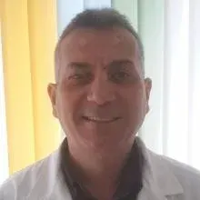 Dt. Hüseyin Öney — Diş Hekimi, Antalya. Portre fotoğrafı.