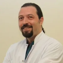 Op. Dr. V. Doğu Kemik — Kadın Hastalıkları Ve Doğum, Bolu. Portre fotoğrafı.