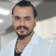 Op. Dr. Toray Bektaş — Ortopedi Ve Travmatoloji, Çukurova, Adana. Portre fotoğrafı.